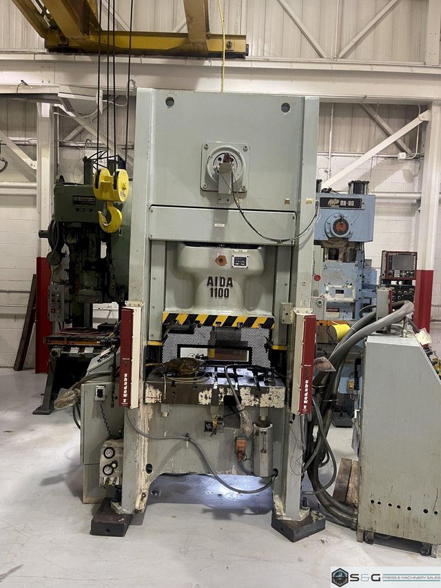 121 ton Aida NS1-1100 Single Point Eccentric Geared Straight Side Mechanical Metal Stamping Press, New 2001