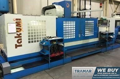 TAKUMI V32A CNC VERTICAL MACHINING CENTER w/Updated Fanuc 18M Control, 126"/40.9"/29.5" Travels, 50 taper, CTT, 32 ATC, Many Updates, 2000