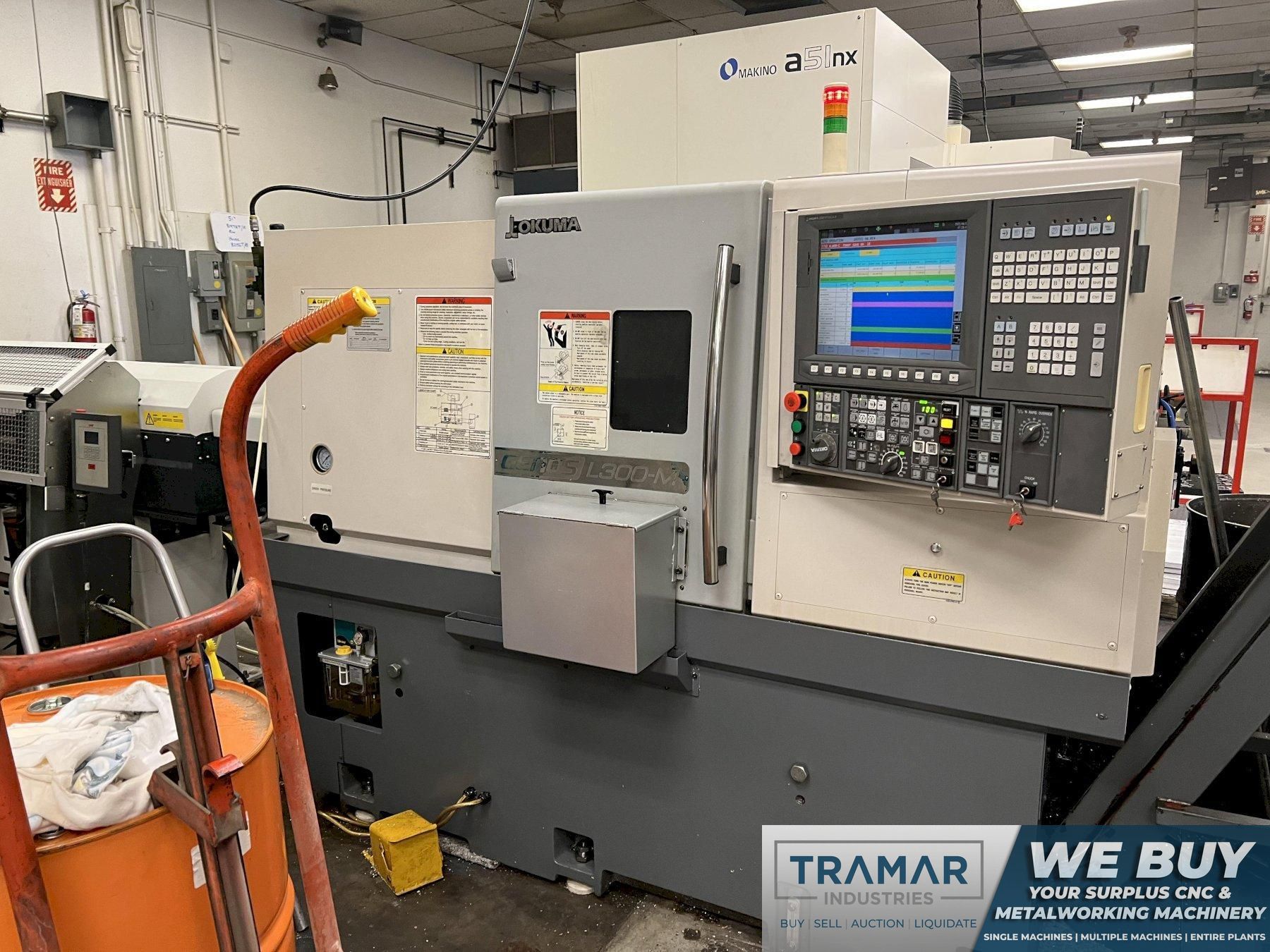 Okuma Genos L300-M CNC Lathe with LNS Quick Six S2 Bar Feeder For Sale 2012