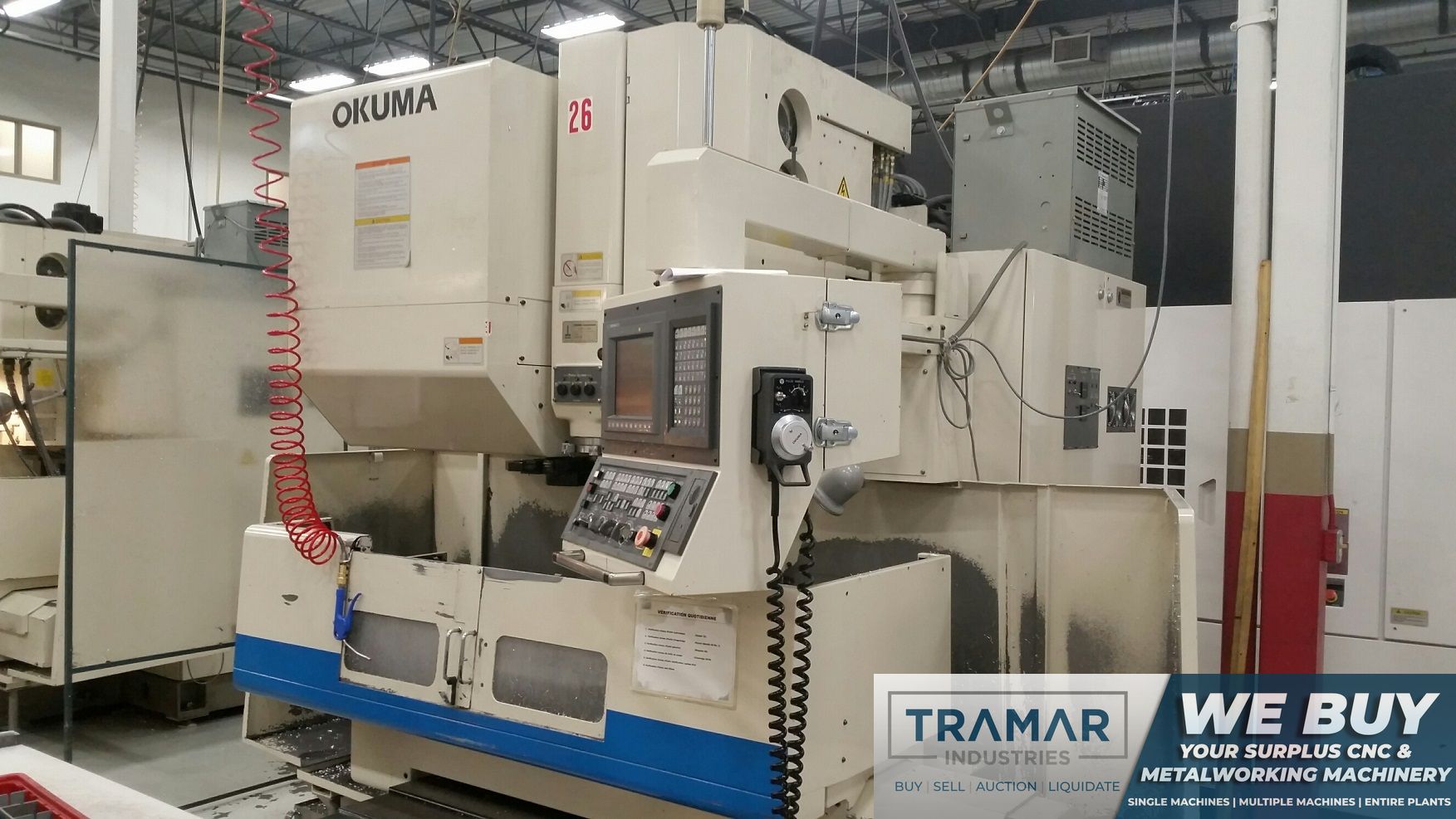 OKUMA MC-40VB CNC VERTICAL MACHINING CENTER WITH 50 TAPER SPINDLE AND 4TH AXIS DRIVE