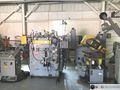 12000 Lbs. x 40" Wide ROWE Used Coil Reel with Powered Straightener For Sale.  Underpower!