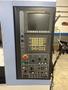 Doosan DNM 500 VMC, 2009 – 4th Axis Wired, Fanuc Control