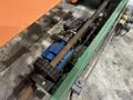SWEED LOAD CLAMP &amp; TURNER / PACMAN FLIPPER SYSTEM WITH POWERED INFEED &amp; OUTFEED CONVEYORS: STOCK #22075