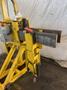 10,000 LBS ADJUSTABLE POWERED COIL GRABBER. STOCK # 0917219