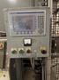 2005 Eagle automated saw and knockout system s/n 05027 with enclosure with light curtain, 2005 Fanuc robot model M-900iA 350 s/n r05743652 with Fanuc system R-J3iB controls s/n e05608535, with saw grips, Eagle enclosure with core knockout system, Allen Bradley plc with panelview 700, core butt discharge conveyor with drive, gate and riser dropoff, related conveyors