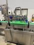 Zhangjiagang Bottling Line for Glass Bottles with Bottle Washer, Filler, Crowner, and Labeler