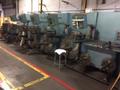 12"  FERRARA SLITTING LINE WITH 5 HEAD TRAVERSE WINDER
