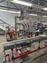 Accutek Bottling Line with Chadam Consultants 2 Head Gravity Filler, Accutek SA-1 Automatic Chuck Capper, Accutek APS106 Labelette Labeler, Everfilt Oil Filtration System, IBC Tanks