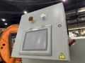 SWEED LOAD CLAMP &amp; TURNER / PACMAN FLIPPER SYSTEM WITH POWERED INFEED &amp; OUTFEED CONVEYORS: STOCK #22075