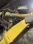2005 Eagle automated saw and knockout system s/n 05027 with enclosure with light curtain, 2005 Fanuc robot model M-900iA 350 s/n r05743652 with Fanuc system R-J3iB controls s/n e05608535, with saw grips, Eagle enclosure with core knockout system, Allen Bradley plc with panelview 700, core butt discharge conveyor with drive, gate and riser dropoff, related conveyors