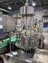 Zhangjiagang Bottling Line for Glass Bottles with Bottle Washer, Filler, Crowner, and Labeler