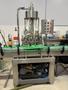Zhangjiagang Bottling Line for Glass Bottles with Bottle Washer, Filler, Crowner, and Labeler