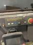 2005 Eagle automated saw and knockout system s/n 05027 with enclosure with light curtain, 2005 Fanuc robot model M-900iA 350 s/n r05743652 with Fanuc system R-J3iB controls s/n e05608535, with saw grips, Eagle enclosure with core knockout system, Allen Bradley plc with panelview 700, core butt discharge conveyor with drive, gate and riser dropoff, related conveyors