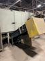 2005 Eagle automated saw and knockout system s/n 05027 with enclosure with light curtain, 2005 Fanuc robot model M-900iA 350 s/n r05743652 with Fanuc system R-J3iB controls s/n e05608535, with saw grips, Eagle enclosure with core knockout system, Allen Bradley plc with panelview 700, core butt discharge conveyor with drive, gate and riser dropoff, related conveyors