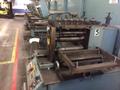 12"  FERRARA SLITTING LINE WITH 5 HEAD TRAVERSE WINDER