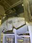 2005 Eagle automated saw and knockout system s/n 05027 with enclosure with light curtain, 2005 Fanuc robot model M-900iA 350 s/n r05743652 with Fanuc system R-J3iB controls s/n e05608535, with saw grips, Eagle enclosure with core knockout system, Allen Bradley plc with panelview 700, core butt discharge conveyor with drive, gate and riser dropoff, related conveyors