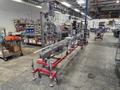 Accutek Bottling Line with Chadam Consultants 2 Head Gravity Filler, Accutek SA-1 Automatic Chuck Capper, Accutek APS106 Labelette Labeler, Everfilt Oil Filtration System, IBC Tanks
