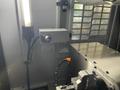 Tornos Almac CU 2007 7-Axis CNC Vertical Machining Center with Part Loading and Parts Catcher System, Probing, 20K Spindle, Lehman 2-Axis Rotary Table, Back Operation Tilting Rotary Vise