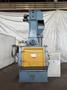 5 CUBIC FOOT TD326 RUBBER BELT TUMBLE BLAST SYSTEM W/ ELEVATOR RECLAIM SYSTEM &amp; DUST COLLECTOR. STOCK # 0670425.