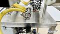 Inline Filling Systems  | Six-Headed Semi-Automatic  |  Overflow Filler
