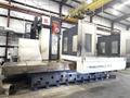 Kuraki AKB-13 5″ Spindle Horizontal Boring Mill, 2015 – Fanuc 0iMB Control 5 Axis Control, 60 ATC, 1000 psi TSC, Rigid Tap, Full B Axis 360 Degree Rotary Table, Barnes Chip/Coolant Separator w/ Lift Up Conveyor