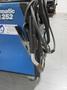 Millermatic 252 MIG Wire Feed Welder with Rolling Base and Accessories, 200/230V Single Phase- Auction Item