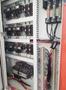 48" X 0.075" USED HERR VOSS HIGH PRECISION COIL LEVELER STRAIGHTENER, MDL. VIL 60/1.500-19/7 4HI, MOTORIZED BANK ADJUSTMENT (2) 3 HP MOTORS, INDIVIDUAL MOTORIZED BACK UP ADJUSTMENT, VACON SERIES X DIGITAL PROGRAMMABLE CONTROL, 7 FLIGHTS OF BACK UP ROLLS, FALK 6C102AS GEAR BOX, HORSEPOWER: 30, Stock # 14128