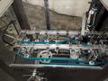 Pace Packaging Omni-Line M400LH S/S Descrambler with S/S Pace Packaging Elevator Conveyor