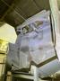 2005 Eagle automated saw and knockout system s/n 05027 with enclosure with light curtain, 2005 Fanuc robot model M-900iA 350 s/n r05743652 with Fanuc system R-J3iB controls s/n e05608535, with saw grips, Eagle enclosure with core knockout system, Allen Bradley plc with panelview 700, core butt discharge conveyor with drive, gate and riser dropoff, related conveyors