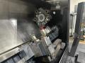 2023 DN SOLUTIONS PUMA 4100LMB CNC Universal Turning Center. Equipped for versatile 2-axis and 3-axis lathing, it features a 15" chuck, 50 HP spindle, and a machining length of 79.8" and with hydraulic open / close steady rest. Perfect for heavy-duty tasks. Fanuc Control, 50HP