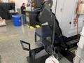 Tornos Almac CU 2007 7-Axis CNC Vertical Machining Center with Part Loading and Parts Catcher System, Probing, 20K Spindle, Lehman 2-Axis Rotary Table, Back Operation Tilting Rotary Vise