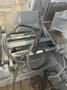 13" X 16" PEERLESS HB1316A HORIZONTAL BAND SAW W/ 10' INFEED AND 20' OUTFEED CONVEYOR. STOCK # 1164323.