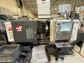 Used 2012 Haas ST-20 CNC Lathe with Bar Feeder For Sale