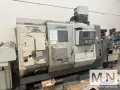 Okuma Simulturn LU300-M CNC Lathe, 2004 w/ Barfeeder