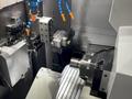 Tsugami Model B0205-VR w/ Fanuc 0i-TF, Fire Trace (5 Lbs), B0-WORK-KIT MKIII (Work Conveyor), Thru Sub Coolant w Pump, Abile Programming Software, Edge Scout 320 Barfeed,  Two Channel Sets , ONLY 73 RUN HOURS