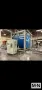 2 ARM ROTOLINE MODEL DC3.00XT ROTATIONAL MOLDING MACHINE MFG 2000