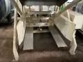 MATERIAL TRANSFER AND STORAGE INC CONTAINER DISCHARGER