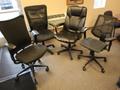 (4) Black Rolling Office Chairs- Auction Item