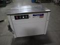 ULINE H-959 Poly Strapping Machine, Semi-Automatic, Portable on Casters- Auction Item