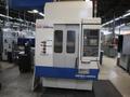 Daewoo Doosan 320/40 CNC Vertical Machining Center with 2 Station Pallet Changer, 12,000 RPM Spindle, 14 Station Rotary Turret, Chip Conveyor- Auction Item