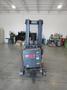 Crown Electric Standing Reach Forklift with Charger, 3500 LB Load Capacity- Auction Item