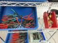 Hand Tools, Large Assortment including Tin Snips, Snap Ring Pliers, Wire Strippers, Banding Cutters and MORE on 4-Shelf Uline 36" x 18" x 78" Metal Wire Rolling Cart- Auction Item