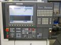 Okuma Genos L250E CNC Turning Center, OSP-P300L/R CNC Control, 8&quot; Chuck, Tool Setter, Parts Catcher, 12-Station Turret, Tailstock, Chip Conveyor