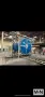 2 ARM ROTOLINE MODEL DC3.00XT ROTATIONAL MOLDING MACHINE MFG 2000