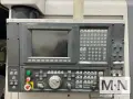 Okuma Simulturn LU300-M CNC Lathe, 2004 w/ Barfeeder
