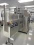 Inline Filling Systems Net-Weight Rotary Jar Filler with Integrated Capping for Clean Room Application in Semi-Conductor Industry, 2009