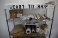 Wire Shelf Unit with 6 Adjustable Shelves, and Contents of Shipping Supplies, Boxes, Shrink Wrap, Corner Protectors and Tape- Auction Item