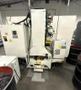 Bulova VMC-4220B Vertical Machining Center 2012 equipped with Fanuc OiMD Control, CT40 Spindle, 24 Station Automatic Tool Changer, Remote Jog Handle, Chip Conveyor, Chip Auger, Coolant Tank