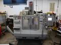 Haas VF-2SS CNC Vertical Machining Center, 12K Spindle, 4th Axis Brushless Drive with SHRT-160H Rotary Table, 24 Station SMTC, Probing, Chip Auger - Auction Item