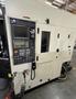 YCM NXV560A-APC VMC, 2015 – Chip Conveyor, Fanuc Control, 12K RPM